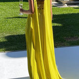 Katrina – Maxi abito con design a spalle scoperte, allacciatura e gonna plissettata