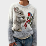 Klara – Plüschpullover mit Weihnachtskaninchen