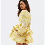 Raelynn - Robe courte à volants et imprimé floral