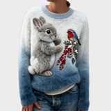 Klara – Plüschpullover mit Weihnachtskaninchen