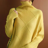 Marcelle – Pull-over en grosse maille à col roulé