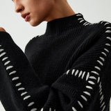 Alma – Pull oversize à col montant et détails piqués