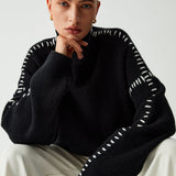 Alma – Pull oversize à col montant et détails piqués
