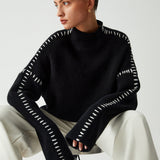 Alma – Pull oversize à col montant et détails piqués