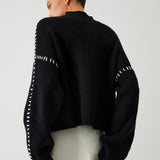 Alma – Pull oversize à col montant et détails piqués