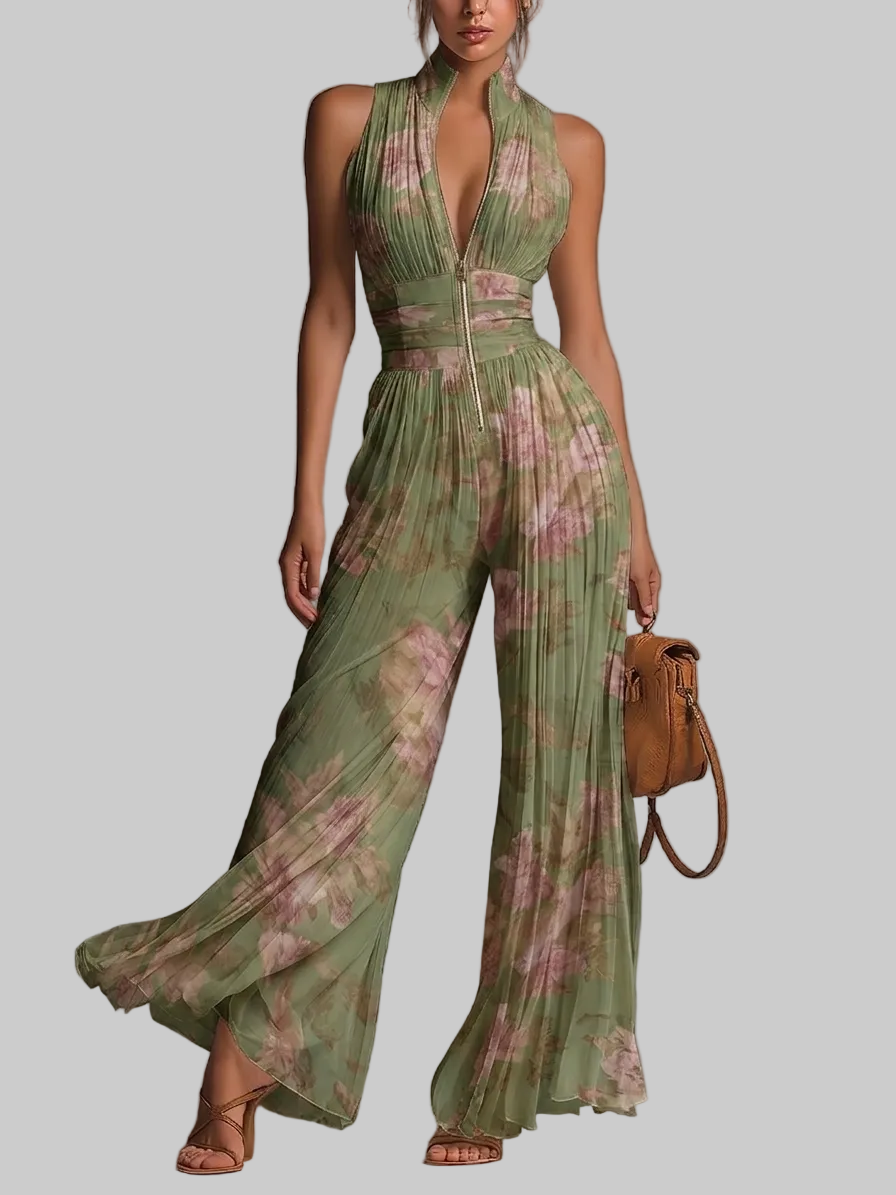 Amelia – Tuta plissettata verde con motivo floreale