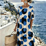 Celeste™ | Abito midi con pois Costiera